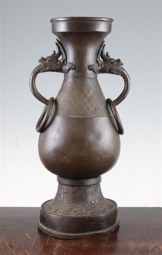 A large Chinese bronze hu vase, Yuan Dynasty, 38.5cm, foot mis-shapen